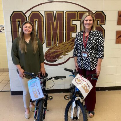 Carlisle County Middle School hosted their annual Comet Cash Auction last week. “Comet Cash” is given to students for exemplary school work, attendance, attitude, responsibility, respectfulness, & Comet pride. Students can use their cash throughout the school year or can save their money to buy items at the end of the year auction. 
CDB donated two bikes as prizes for these high achieving comets. We hope you all had another great auction! Pictured: CDB's Payton Brown & CCMS Principal Tosha Arnold.